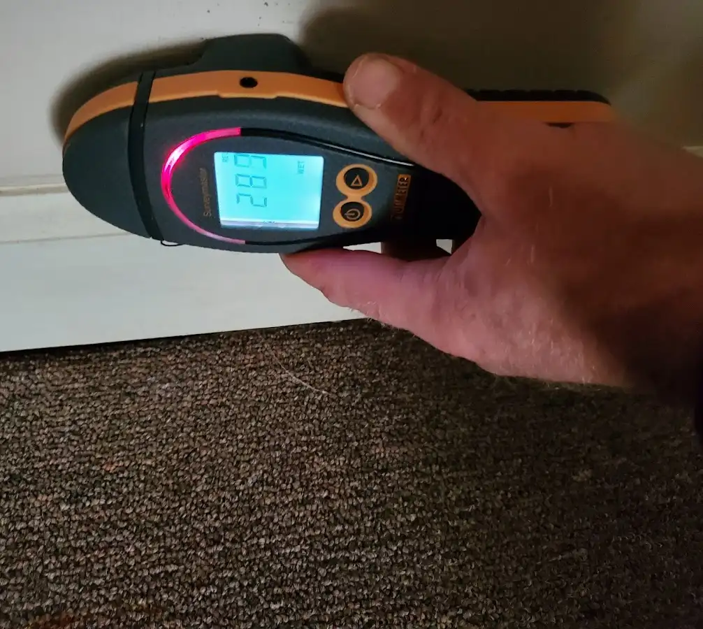Moisture detection at baseboard during Mold Inspection & Testing in Waco